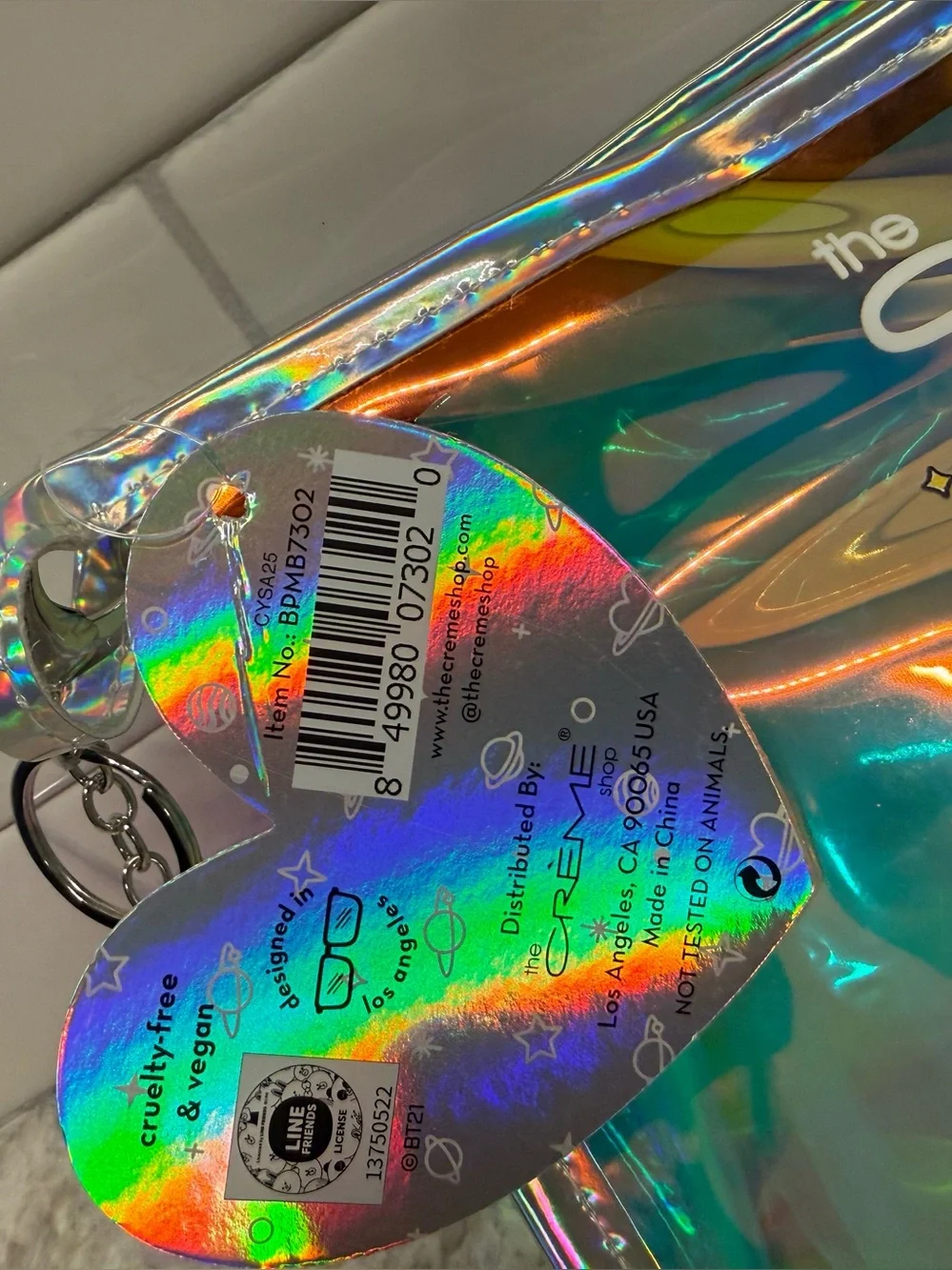 Crème Shop holographic BT21 pouch with purple fuzzy star charm NWT